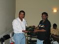 Umesh (Captain) presenting the Hall of fame Honorary award to Mr.Flyod Campbell